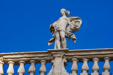 Fototapeta premium Palazzo Maffei with statue of divinitiy at Piazza delle Erbe in Verona, Italy