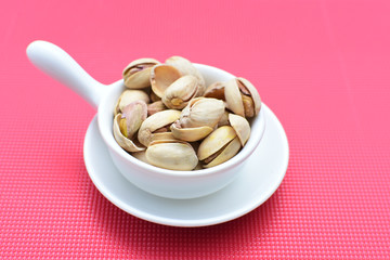 Pistachios in colorful and natural backgrounds
