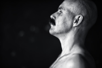 unusual portrait of a bald mustachioed young gentleman, eccentric mister, psychology concept