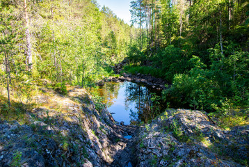 View of Kiutakongas Rapids area, rocks, trees and water, Oulanka National Park, Kuusamo, Finland