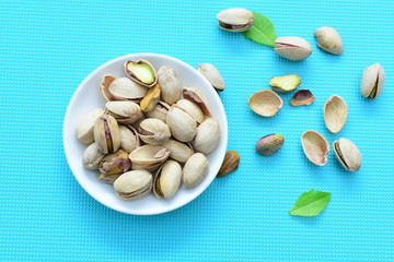Pistachios in colorful and natural backgrounds
