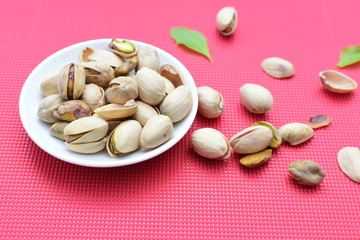 Pistachios in colorful and natural backgrounds