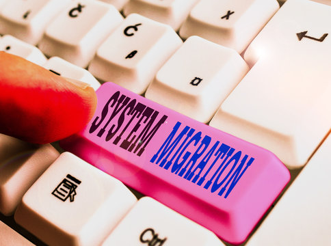 Word writing text System Migration. Business photo showcasing moving from the use of one operating environment to another