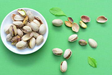 Pistachios in colorful and natural backgrounds