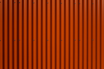 New orange texture steel container or fence. Industrial object.