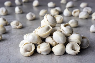 Dumplings taken out of the freezer and scattered on the table