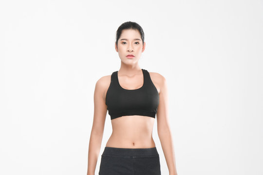 Shapely woman long hair wearing black fitness clothes in a series of exercises isolated on white background.