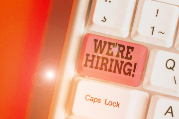 Conceptual hand writing showing We Re Hiring. Concept meaning recently employ someone or pay him to...