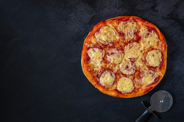 pizza salami sausages (tomato sauce, cheese, meat). food background. top view. copy space