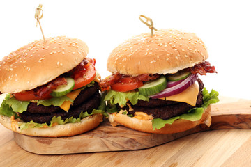 Tasty fresh meat burgers with salad and cheese. Homemade angus burger.