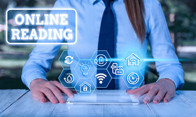 Text sign showing Online Reading. Business photo showcasing process of extracting meaning is in a...