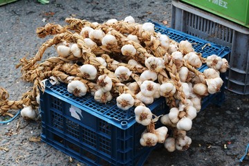 Bunch of garlic on plastic box