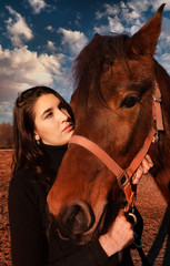 A beautiful woman with the horse