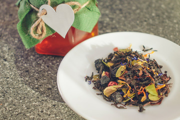 Natural tea brew with a jar of honey.