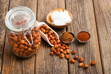 hazelnut cream ingredients on old wooden table