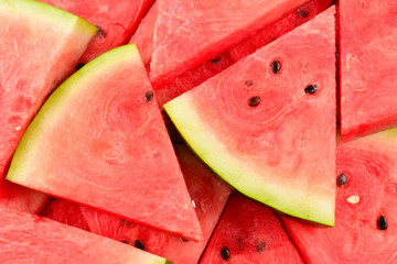 Juicy watermelon slices background. Top view.