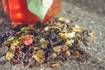 Natural tea brew with a jar of honey.