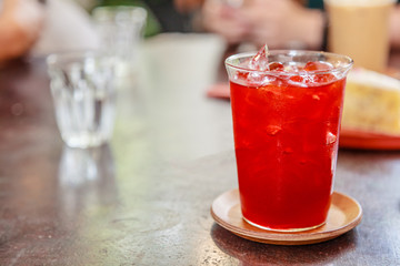 Selective Focused Thai Tea, Refreshing Soft Drink to get rid of thirst with sweet aroma from lime and cooling tasty flavor. Colorful Traditional Asian Drink for Hot Thirsty Tropical Summer concept.