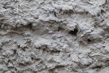 Background concrete texture. The wall of an unfinished building.