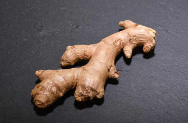ginger root on stone board
