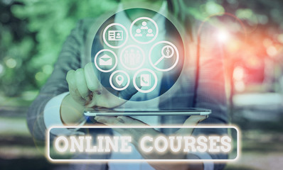 Word writing text Online Courses. Business photo showcasing courses deliver a series of lessons to a web browser
