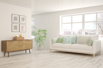 White stylish minimalist room with sofa and winter landscape in window. Scandinavian interior design. 3D illustration