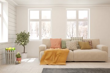 Stylish room in white color with sofa and winter landscape in window. Scandinavian interior design. 3D illustration