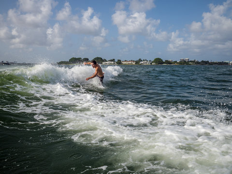 Man loses balance and falls to the water while wakeboarding in Miami