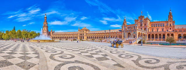 Fototapeta premium The tourist carriage in Plaza de Espana in Seville, Spain