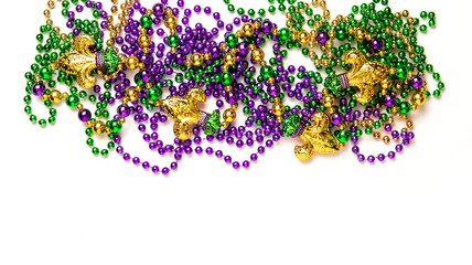 Carnival decoration Mardi gras beads white background © LiliGraphie