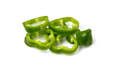 Sliced fresh green paprika isolated on white background.