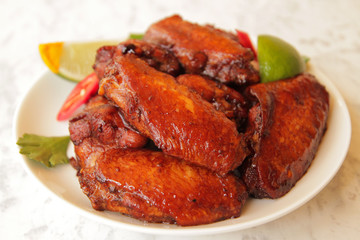  grilled chicken wings with lime and hot pepper.
