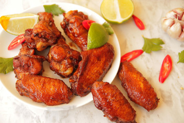  grilled chicken wings with lime and hot pepper.
