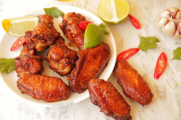  grilled chicken wings with lime and hot pepper.
