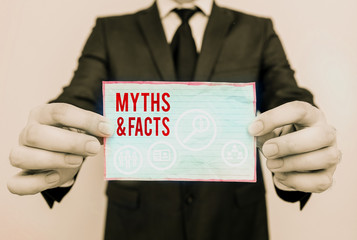 Word writing text Myths And Facts. Business photo showcasing usually traditional story of...