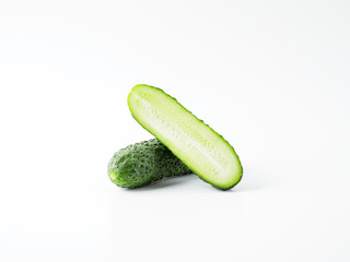 Fresh green cucumber on white background.