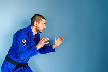 Brazilian jiu jitsu bjj caucasian athlete instructor professor or fighter standing in front of the...