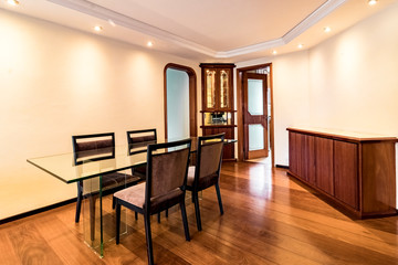 modern interior of a living room with table chairs sofa