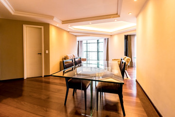 modern interior of a living room with table chairs sofa