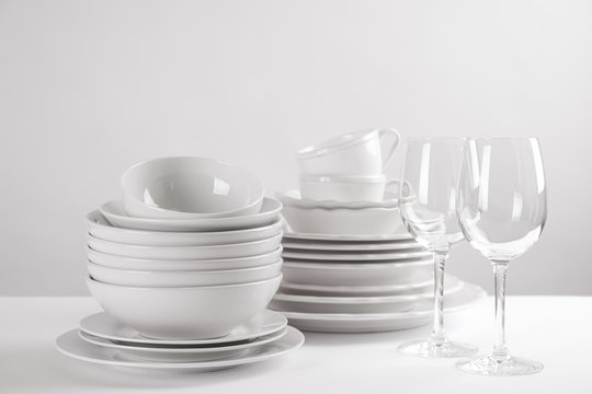 Set Of Clean Dishes On White Table