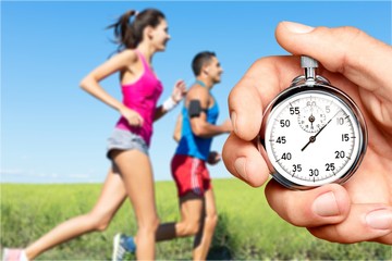 Metal classic Stopwatch with running human hand