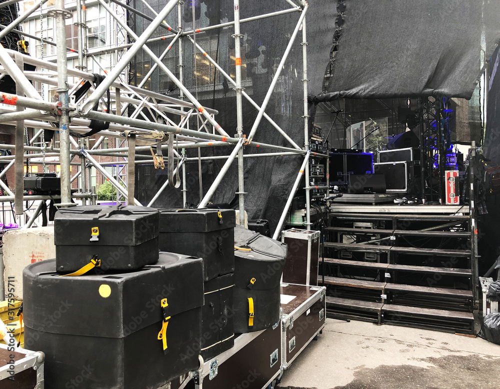 Wall mural Backstage zone with flight cases, drum cases and other concert equipment.