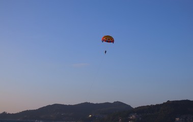 Parasailing at Patong Phuket Thailand at Sunset beautiful colours