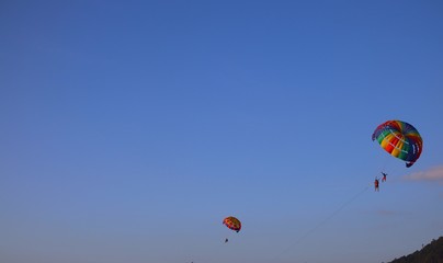Parasailing at Patong Phuket Thailand at Sunset beautiful colours