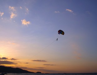 Parasailing at Patong Phuket Thailand at Sunset beautiful colours