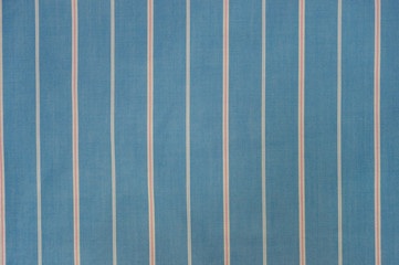  blue fabric with  vertical white and red stripes