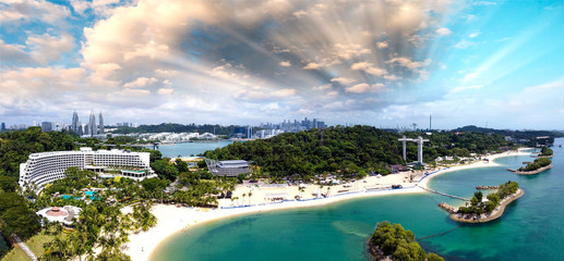 Panoramic aerial view of Siloso Beach and Sentosa Island at sunset, Singapore © jovannig