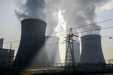 Heavy industrial air pollution from smokestacks. Factory chimney blowing pollution in environment....