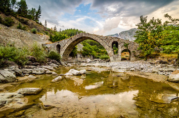 Fototapeta na wymiar Old ottoman Kasabashi Bridge near Corovode in Albania