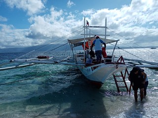 Obraz premium fishing boat in the sea